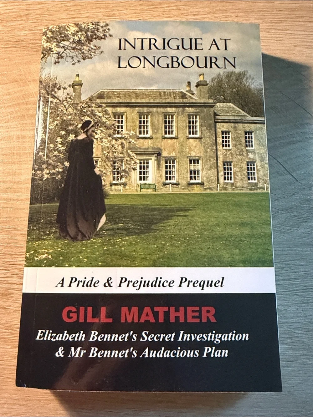 Intrigue at Longbourn by — Green & Black Cover Coffee Table Book